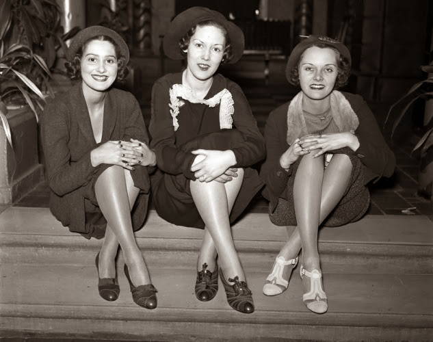 #20 1930s shoes are definitely back in style, with tons of ladies rocking similar kicks today. Here, models show off blue kid tongued pumps, brown kid oxfords and multi-colored evening sandals.