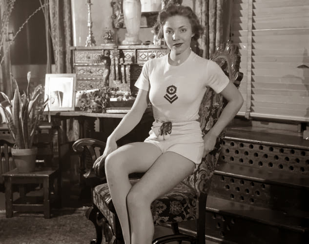 #10 Model Mardee Hoff, selected for having the most perfect figure in America at the time, poses in short shorts in 1935.
