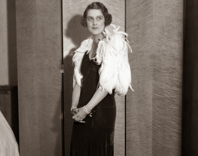 #14 Feathers are typically Lady Gaga’s thing, but model Mrs. George Harris rocked the look first in 1932 with a feather cape over her black velvet evening gown at a society fashion show.