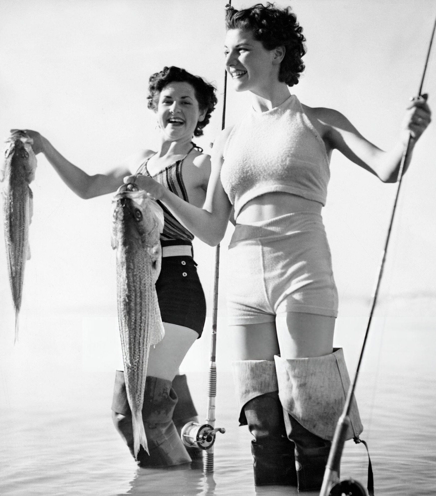 #51 Two women ice fishing in California, 1937.