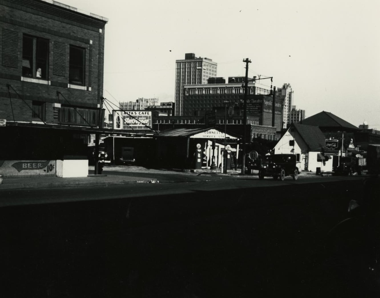 #101 A gas station in downtown Fort Worth, Texas, 1930s.