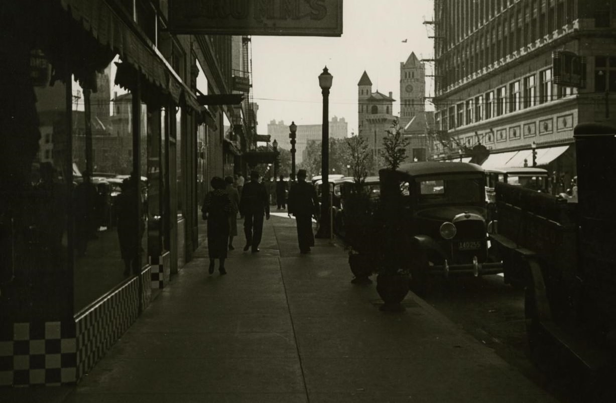 #106 Pedestrians on a sidewalk in Fort Worth, Texas, 1930s.