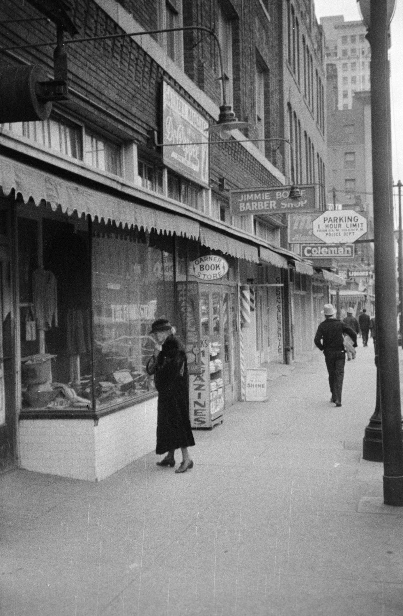 #75 Pedestrians on a sidewalk in downtown Fort Worth, Texas, 1930s.