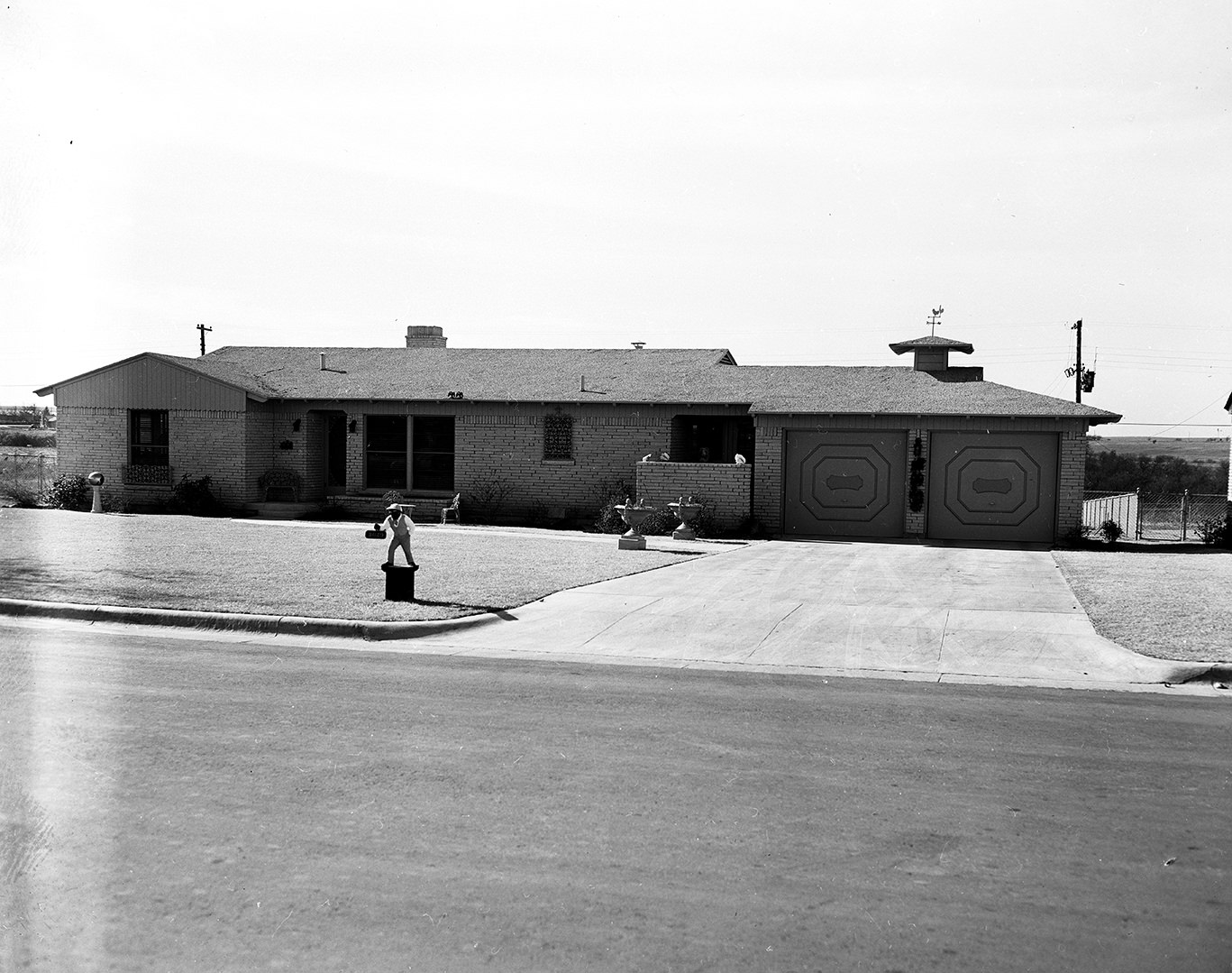 #101 The Dowlin house, pink and green smith stone home at 3629 Manderley, 1951.