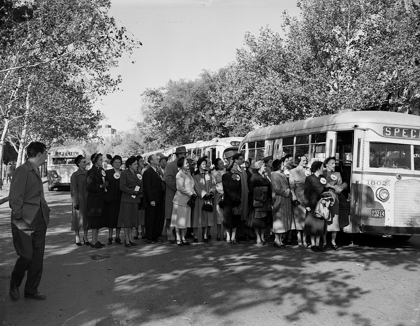 #27 Fort Worth public school teachers boarding a bus for a visit with local industries, 1950.
