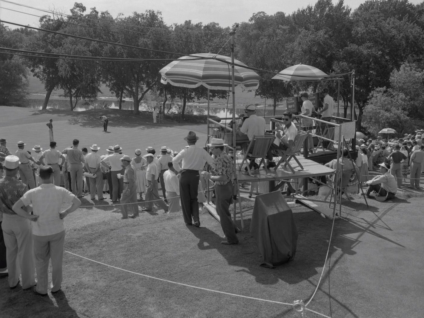 #8 Journalists filming a golf event, possibly the Colonial, in Fort Worth, 1954.