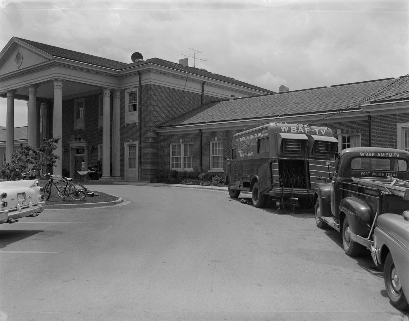 #10 Colonial Country Club in Fort Worth, with WBAP vehicles, 1959.