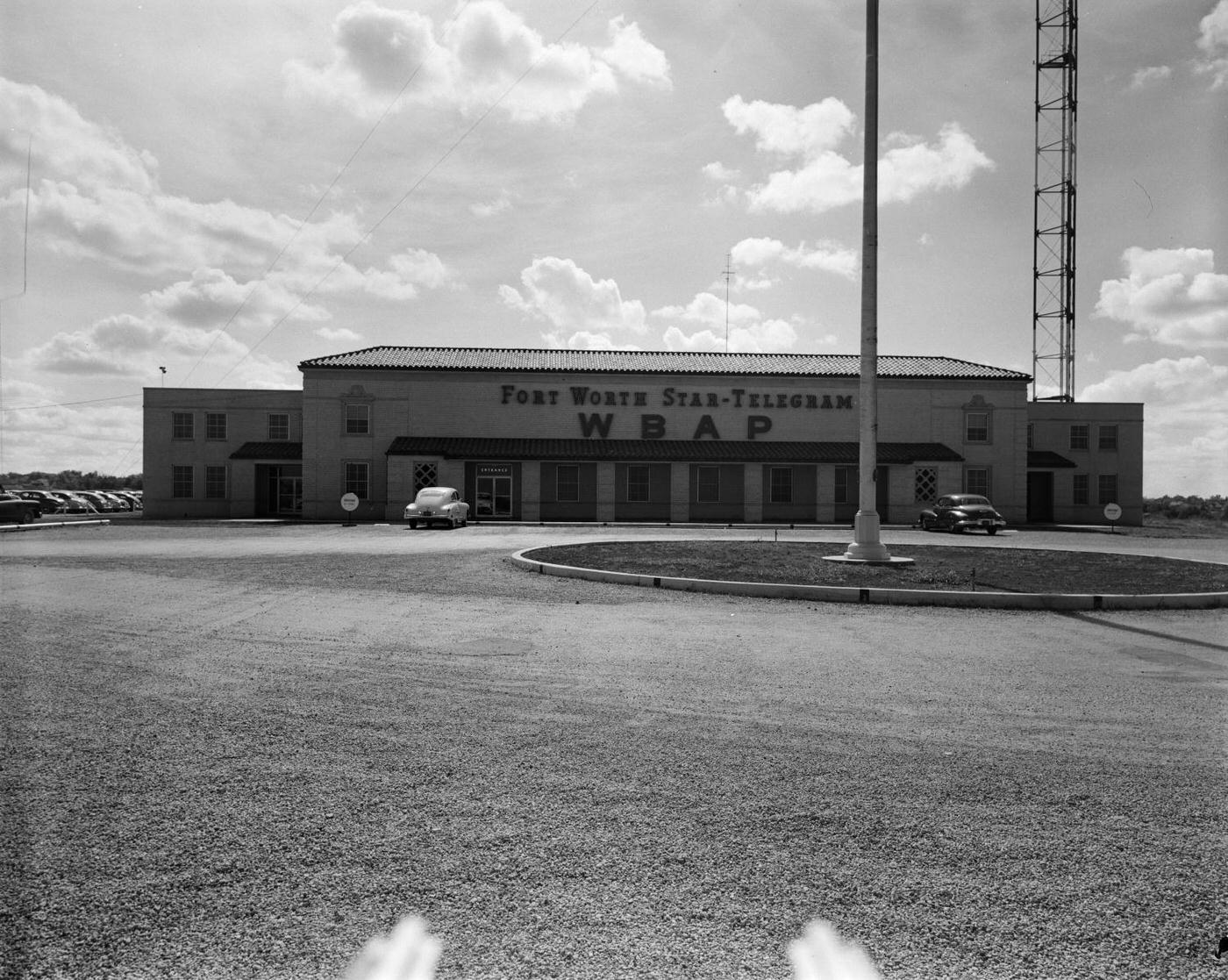 #20 The Fort Worth Star-Telegram WBAP building with parked cars, 1950.