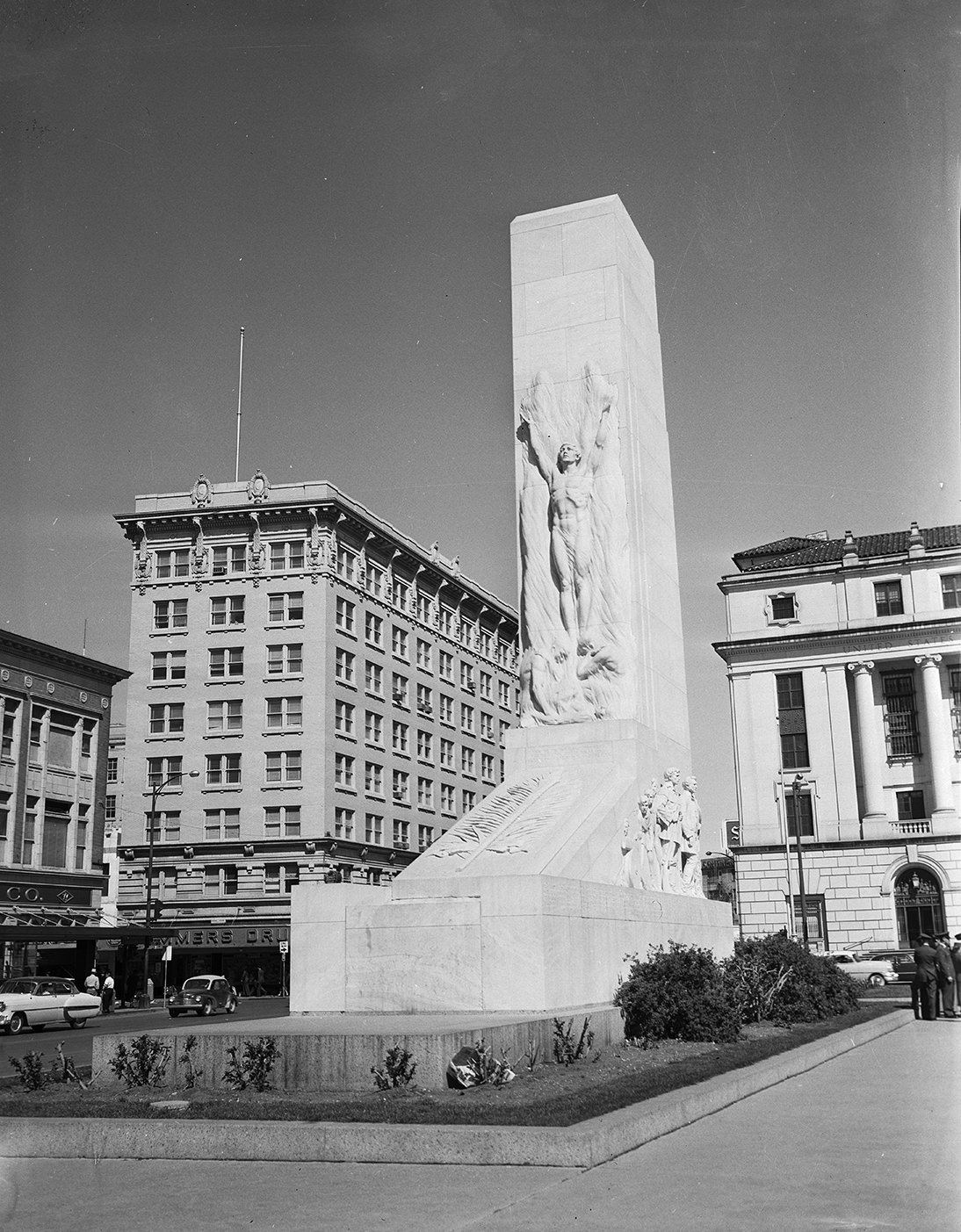 #57 The Alamo Cenotaph, which depicts the “Spirit of Sacrifice,” in Alamo Plaza, San Antonio, 1954.
