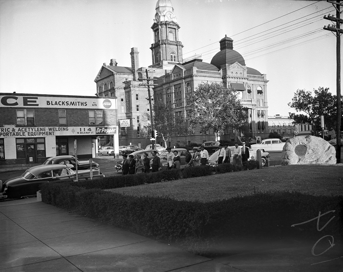 #84 The jury hearing the trial of Mrs. Mary Clark returning to the Criminal District Court Building after a lunch break, 1955.