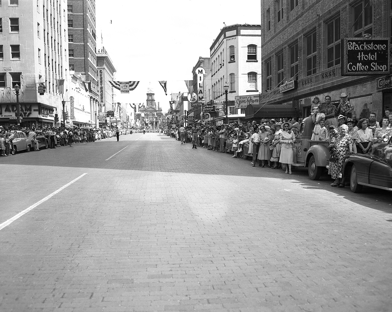 #90 Street view of the General Douglas MacArthur parade in Fort Worth, 1951.