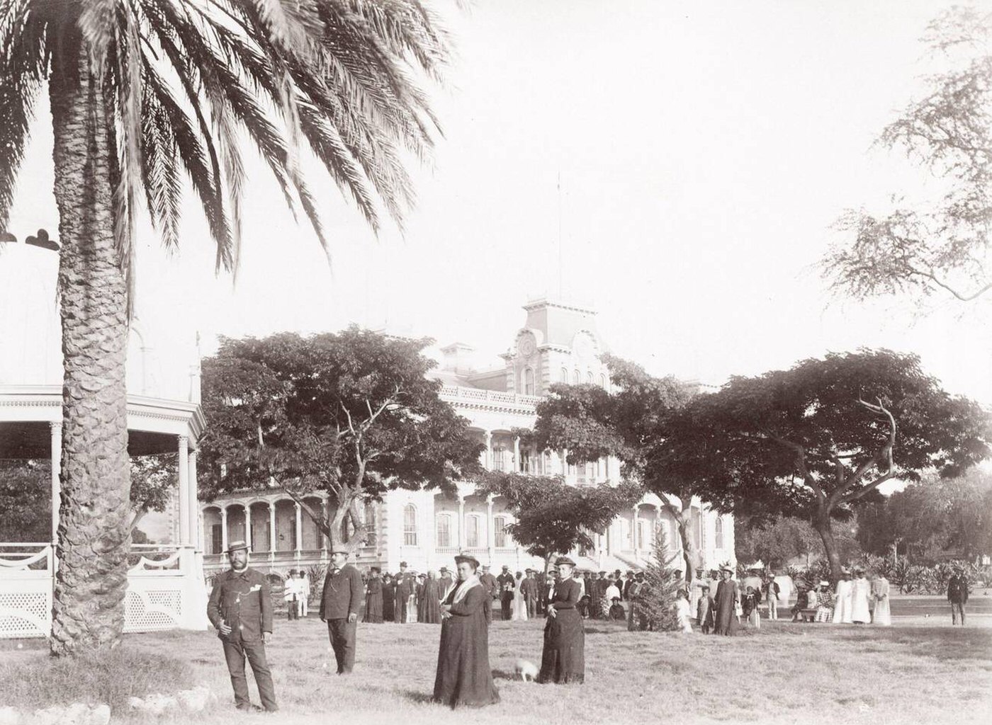 #19 King and Queen of Hawaii outside the Royal Palace, 1900.