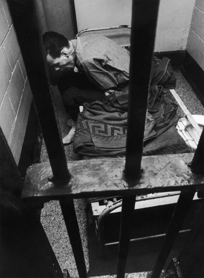 #15 John in jail for disorderly conduct, suffering withdrawal pains in his cell.