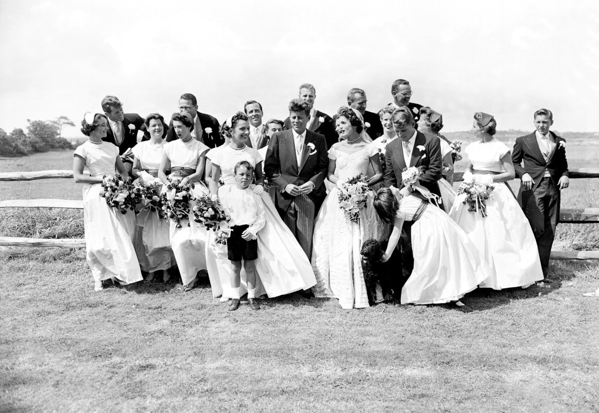 #14 John F. Kennedy and Jacqueline Lee Bouvier with their wedding party, 1953.