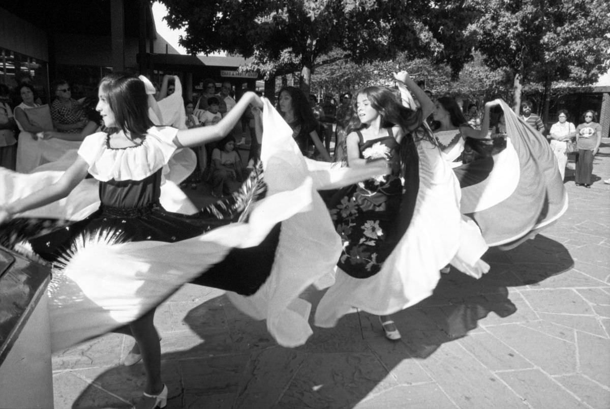 #2 Young girls perform a traditional Mexican dance at Seminary South Mall in Fort Worth, Texas, during the Mexican Independence Day celebration, 1977.