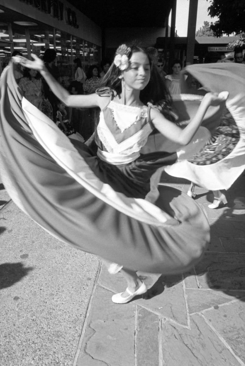 #6 Cecilia Galindo dances a traditional Mexican dance at the Mexican Independence Day celebration in Fort Worth, Texas, 1977.