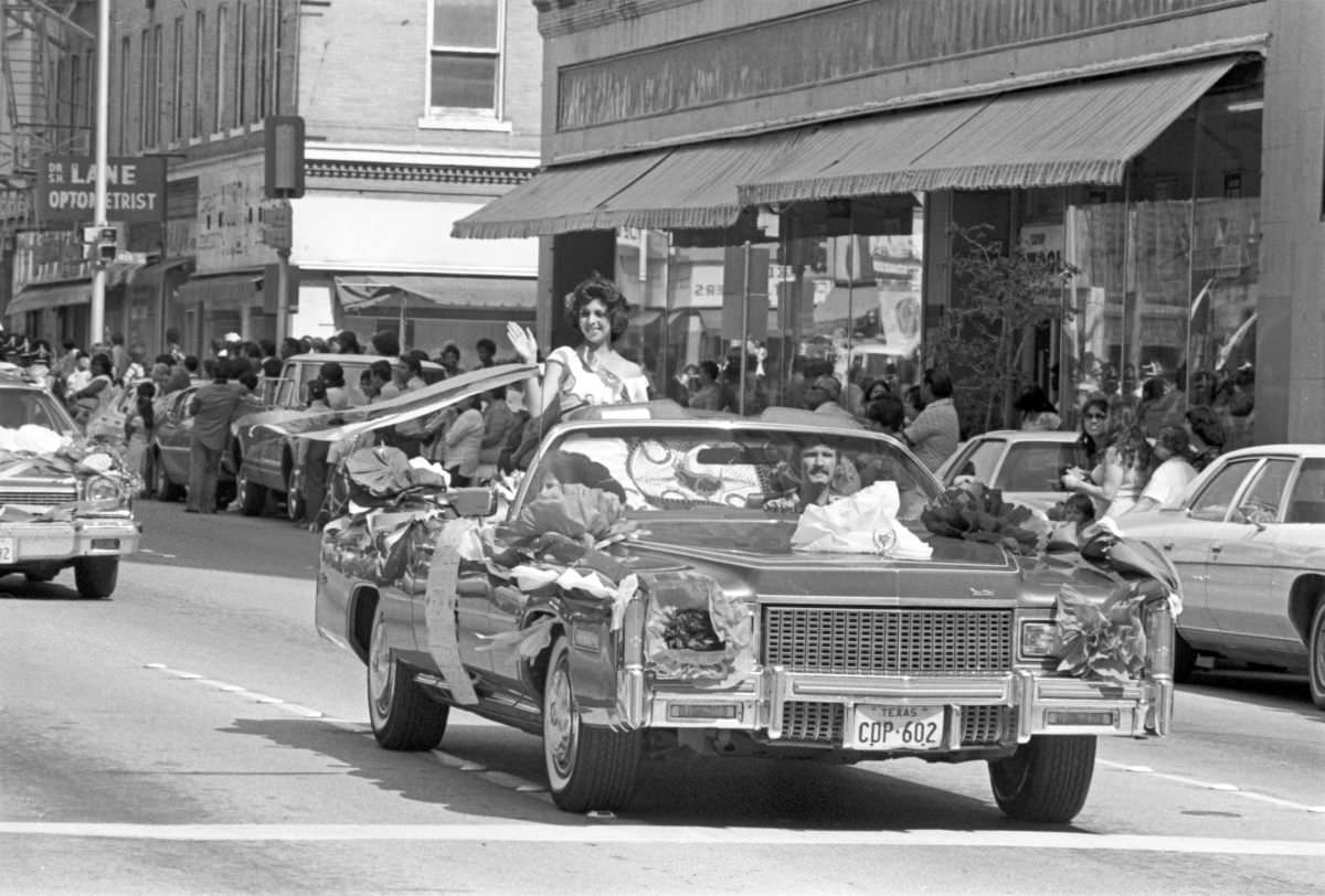 #10 A candidate for the Mexican Independence Day Fiesta Queen waves from a convertible in Fort Worth, Texas, 1977.
