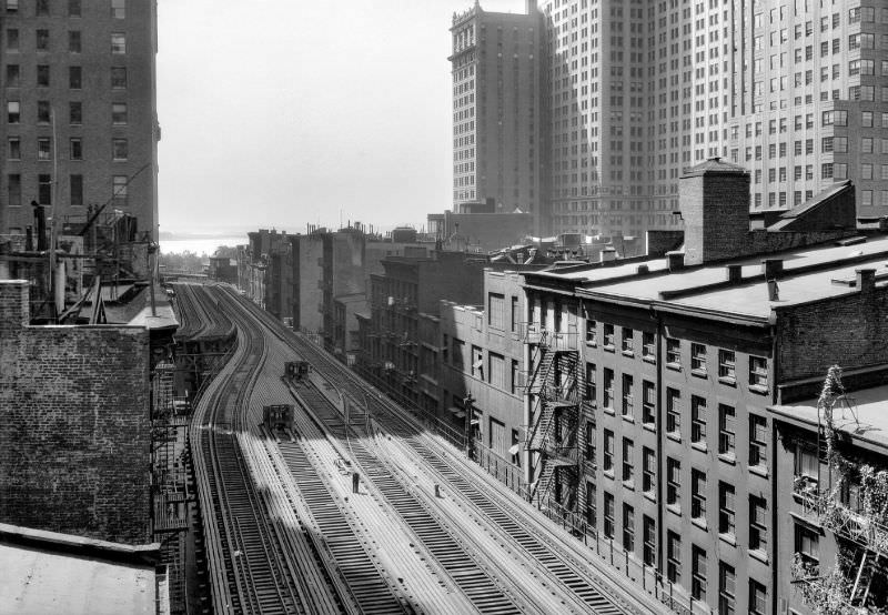 #21 Looking south along west side of Greenwich Street toward Battery over elevated structure, New York, 1940.