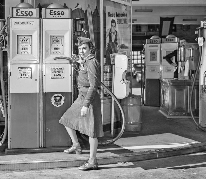 #23 Girl at gasoline pump, New York, 1940.