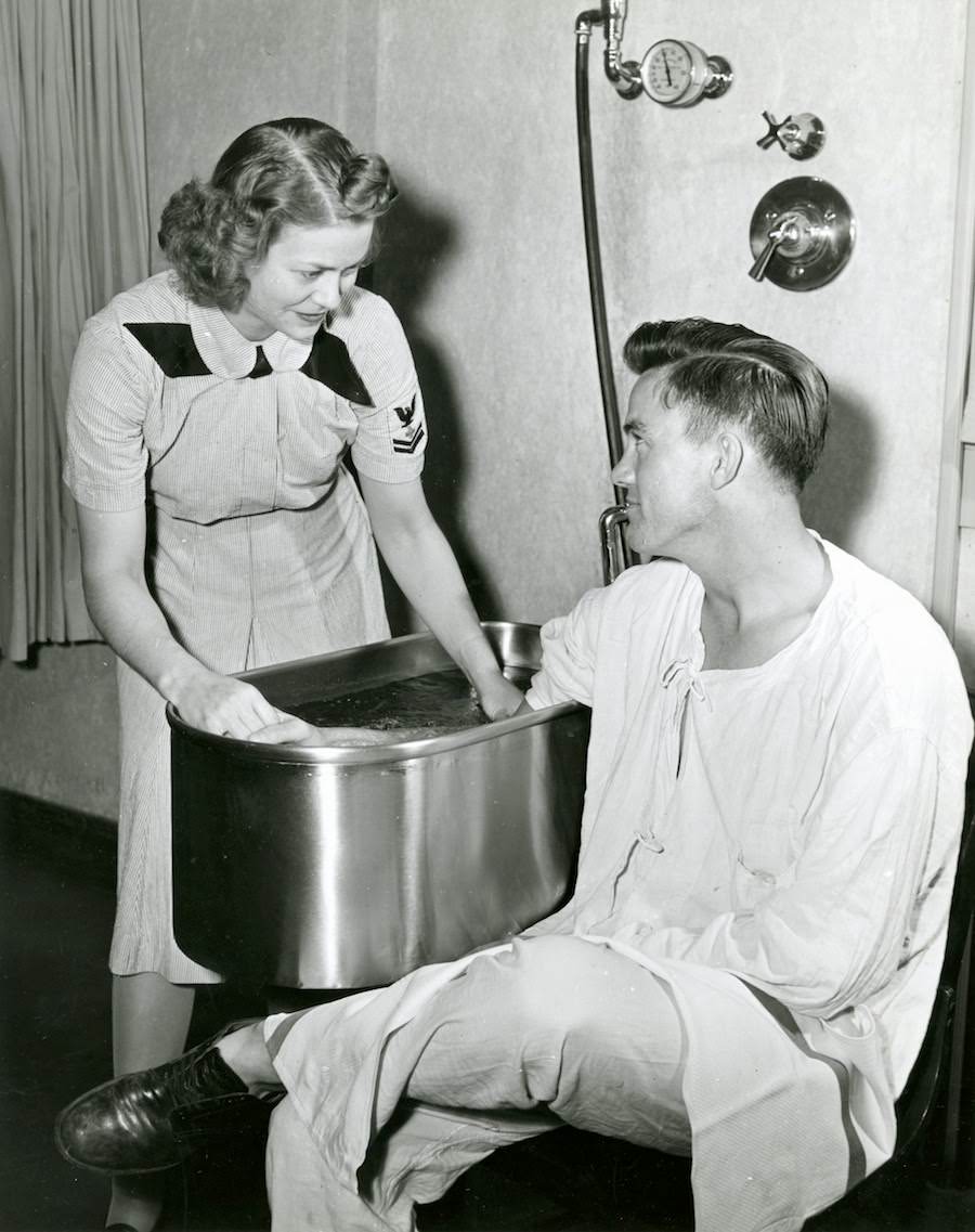 #13 Nurse with sailor, 1940s.