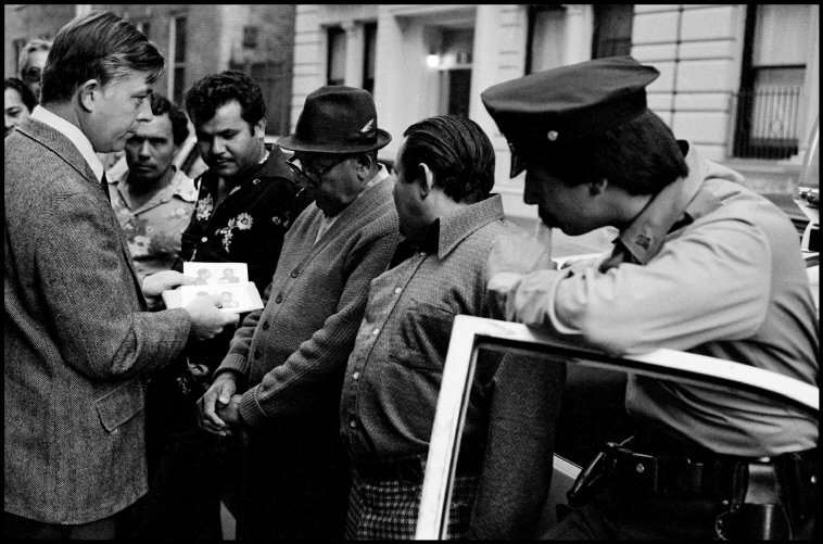 #31 Homicide investigators show photos of suspects to residents, 1972.