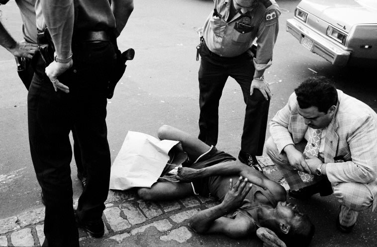 #53 Soon came to a man lying in the street, 1978.