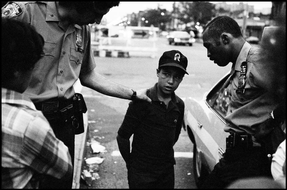 #55 Police separate two fighting teens, 1978.