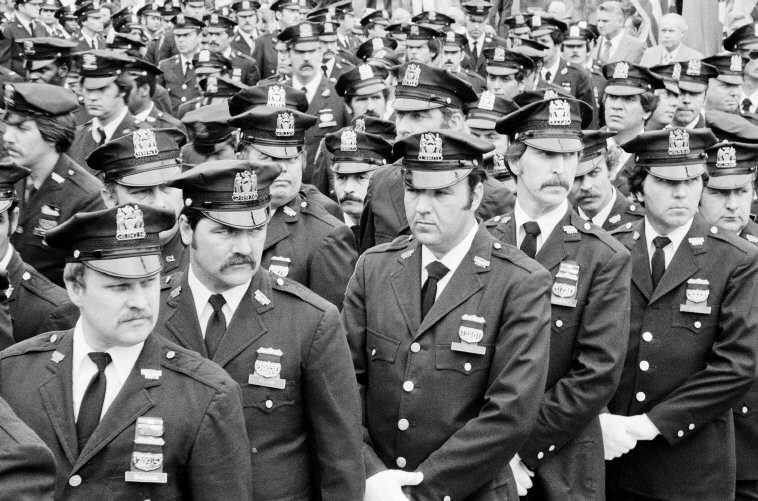 #68 The funeral of a police officer who was killed on duty, 1979.