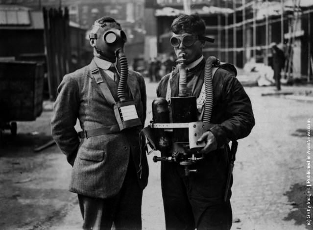 #25 A gas mask and diving mask demonstrated at the Engineering & Machinery Exhibition, London, 1929.
