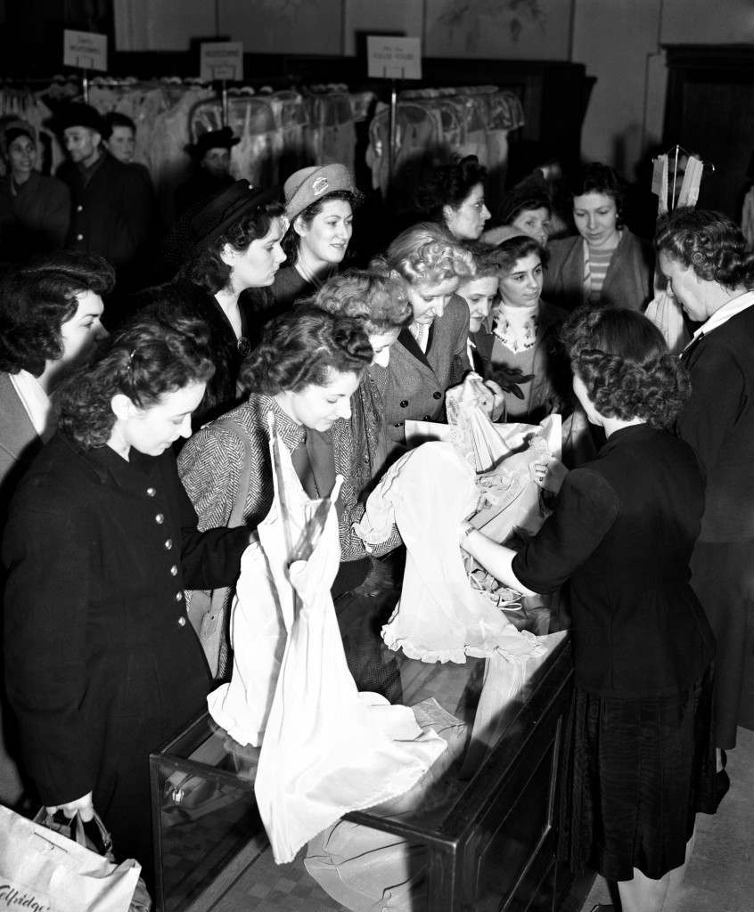 #27 Selfridges on the day that clothes were taken off the rationing list, 1949.