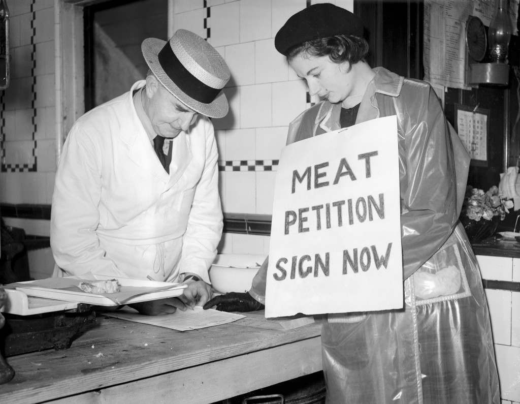 #3 Butcher Charles Wesson signs a petition urging the return of the nation’s meat buying to private traders, 1951.