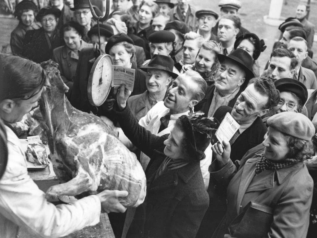 #4 The only thing wrong with this picture is the ration book held by a woman, featuring unrationed reindeer meat, 1951.