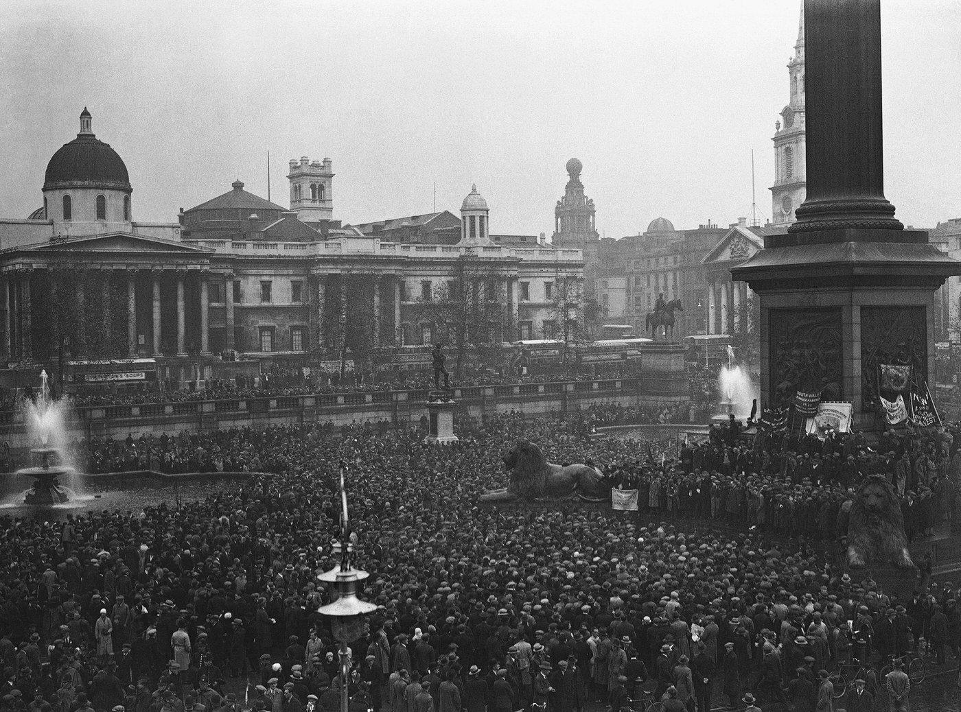 #12 A demonstration of unemployed people in Trafalgar Square, 1932.