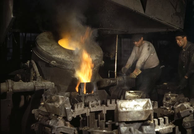 Casting a billet from an electric furnace at Chase Brass and Copper Co., Euclid, Ohio, 1942.