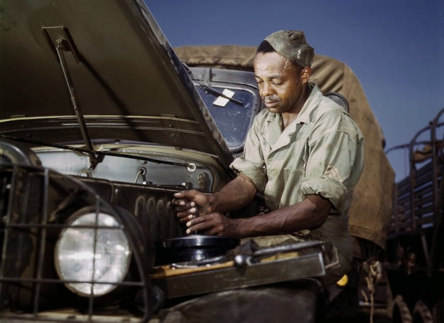 A colored mechanic in the motor maintenance section at Fort Knox, Kentucky, 1942.