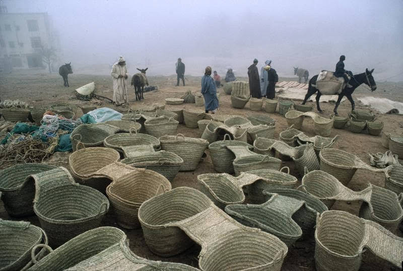 #37 Market selling woven carrying baskets for donkeys, a traditional method of hauling goods, 1984.