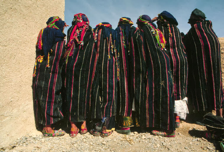 #39 Young brides-to-be wearing capes of berber design and covered in silver ornaments, 1984.
