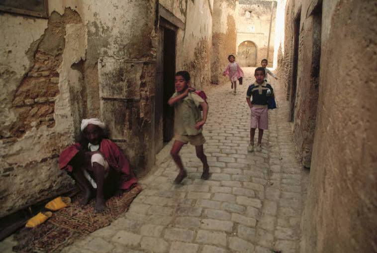 #42 Beggar in old town, 1984.