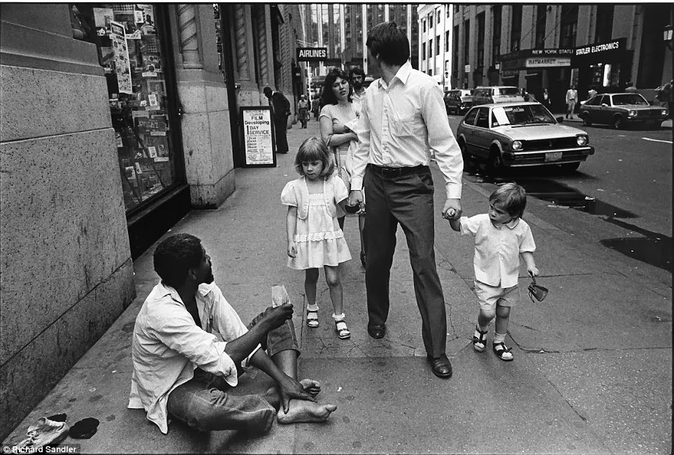 #33 Two children stare curiously at a homeless man on 32nd Street, 1981.