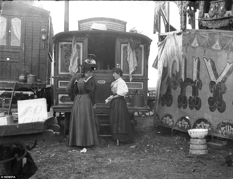 #5 Women chat outside caravans stationed at the city’s Town Moor.
