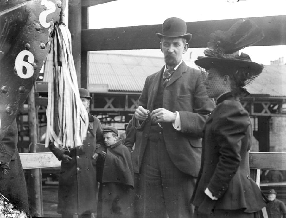 #9 Onlookers wait for the launch of a ship in Tyneside.