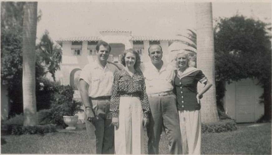 #14 Al Capone with his family in Florida after his release from prison.