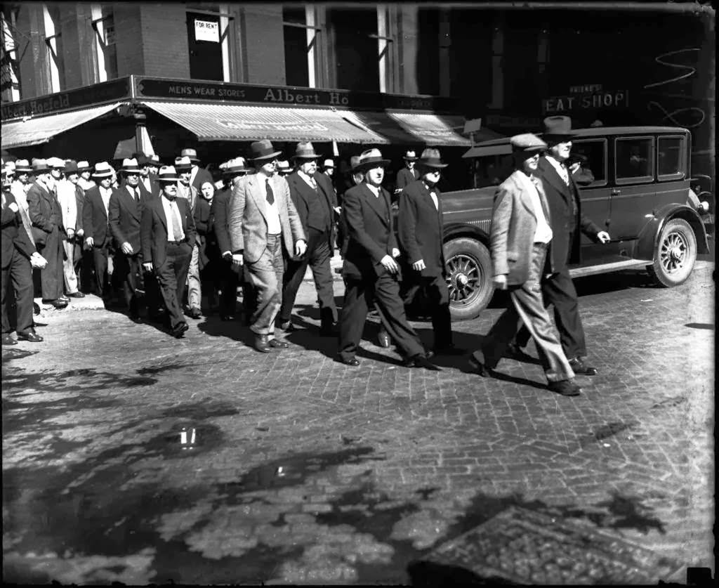 #19 Al Capone trial jury members going to lunch, 1931.