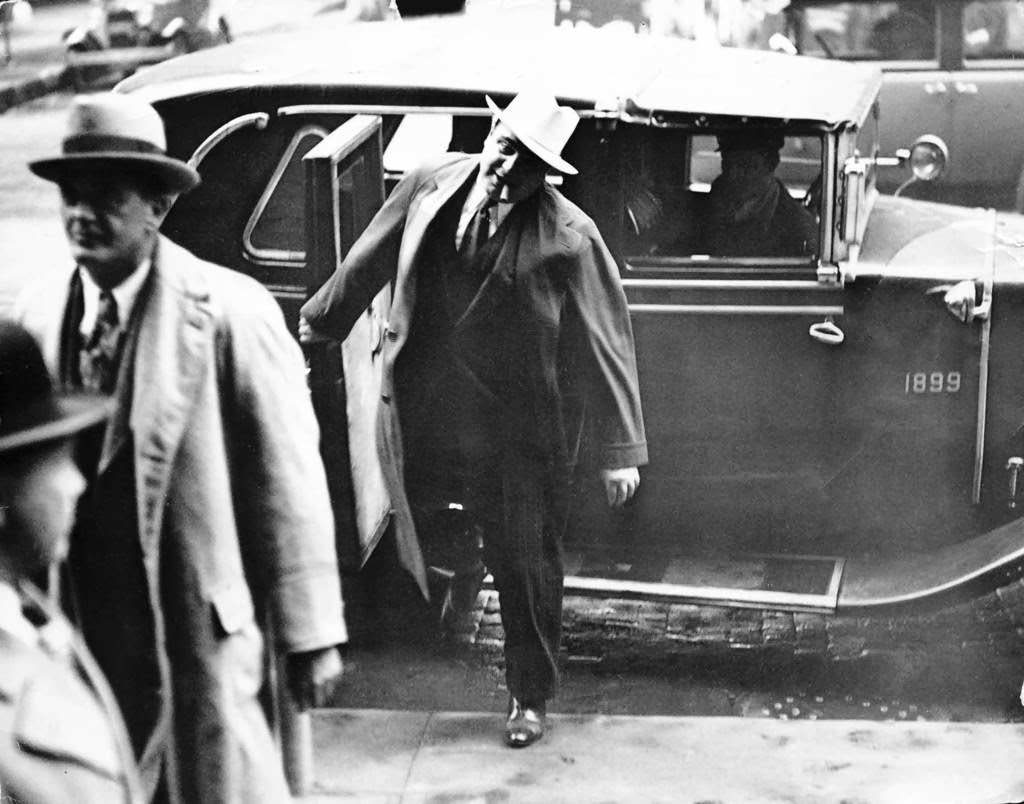 #22 Al Capone and attorney Michael Ahern arriving at the federal building, October 13, 1931.
