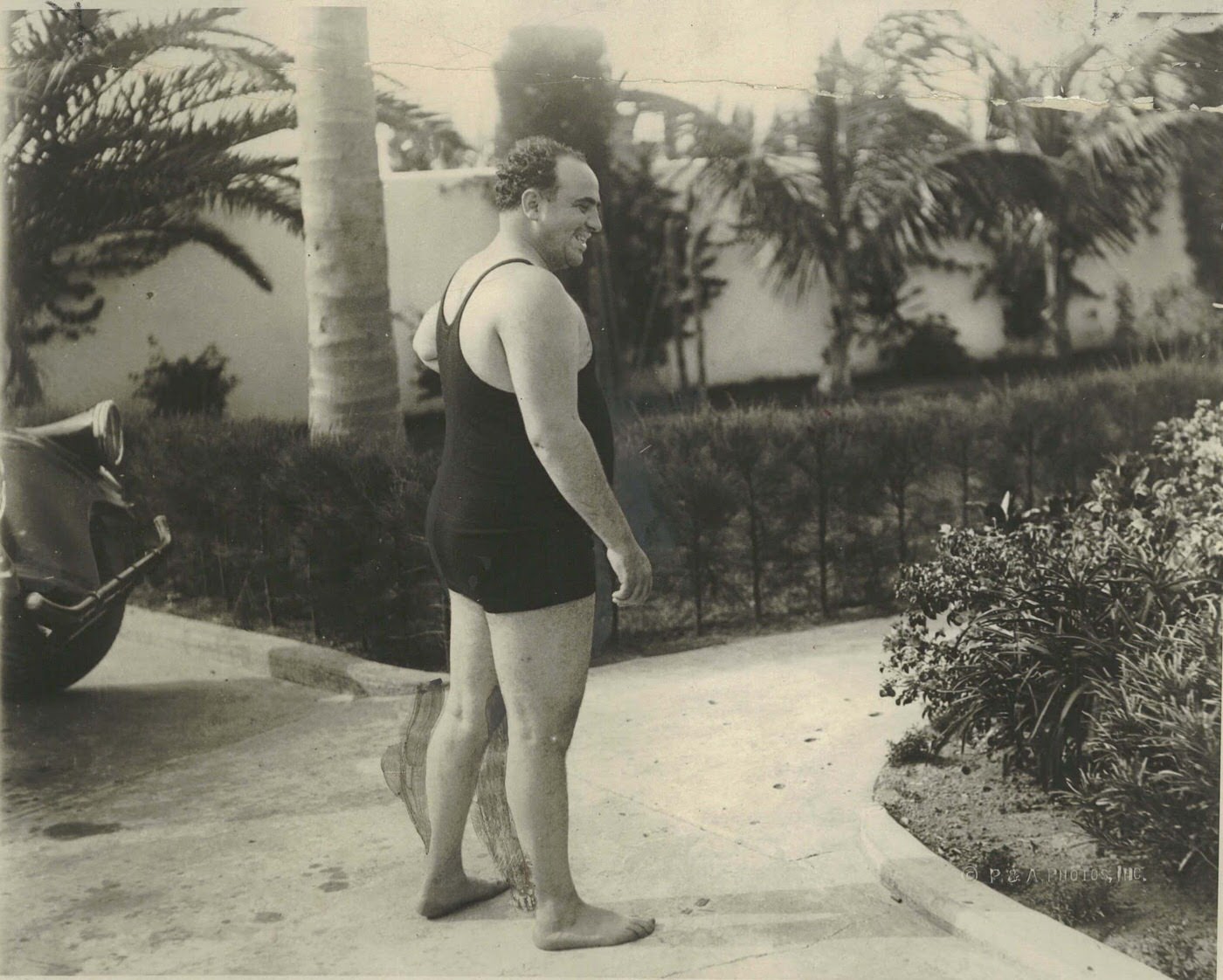 #4 Al Capone in a bathing suit in Palm Island, Florida, 1929.