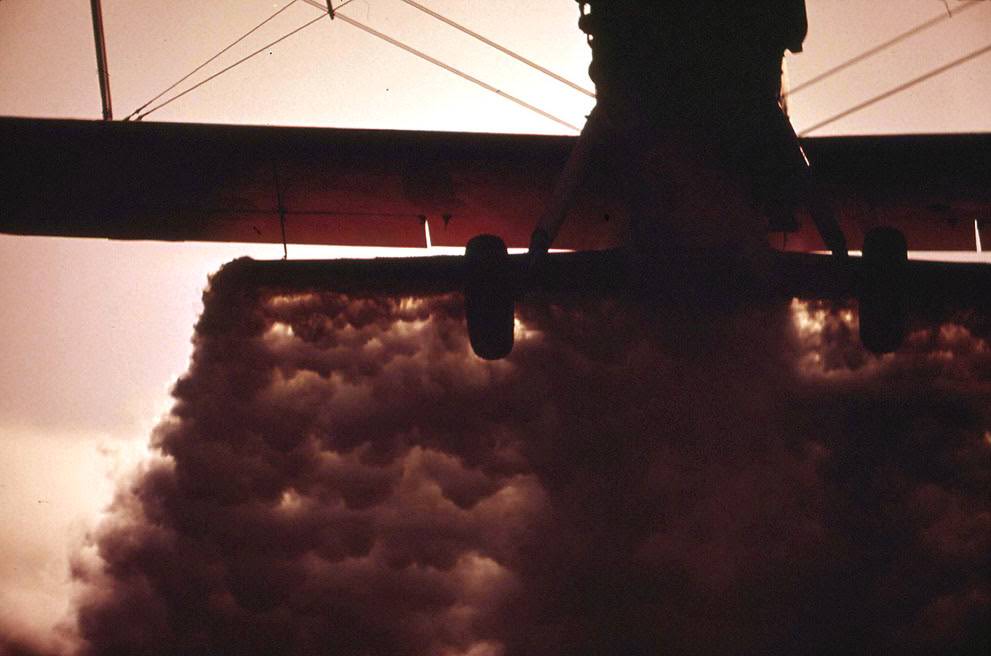 #2 A crop duster plane flies low over a field in California’s Imperial Valley, 1972.