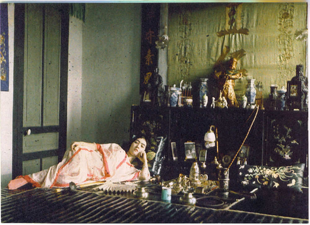 Woman smoking opium, 1915