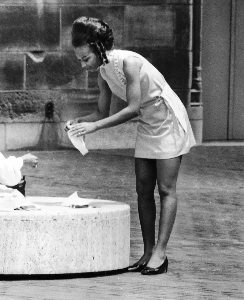 “Chic in a Mini, young lady unwraps her lunch to delight of the males.” — Jack Mulcahy, Chicago Tribune, Jan. 30, 2014