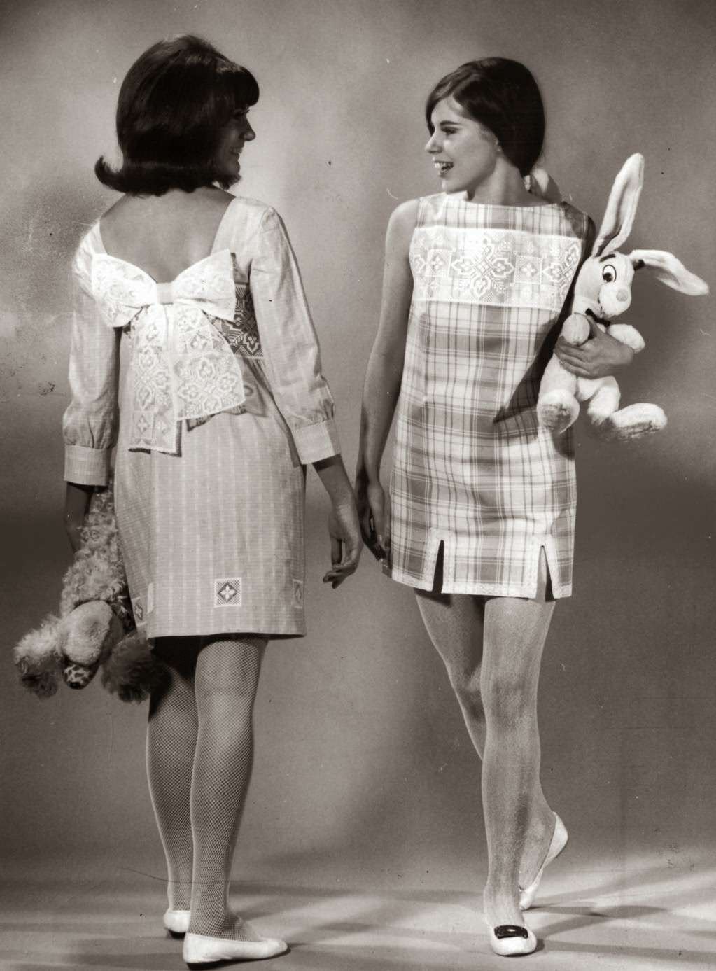 “Venetian lace is used for this pair. Pam Kimmell, left, Wheaton high school, wears a short dress of turquoise and white lawn ($35), trimmed with giant bow and cut-outs at hemline. Teri’s blue on white plaid cotton skimmer ($22.95) features wide band of lace and narrower lace edging at hem.” — Earl Gustie, Chicago Tribune, Nov. 3, 1966