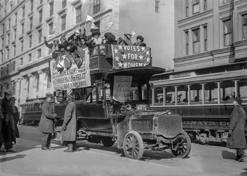 #17 Suffragists on a bus in New York City, part of the “hike” to Washington, D.C., 1913.